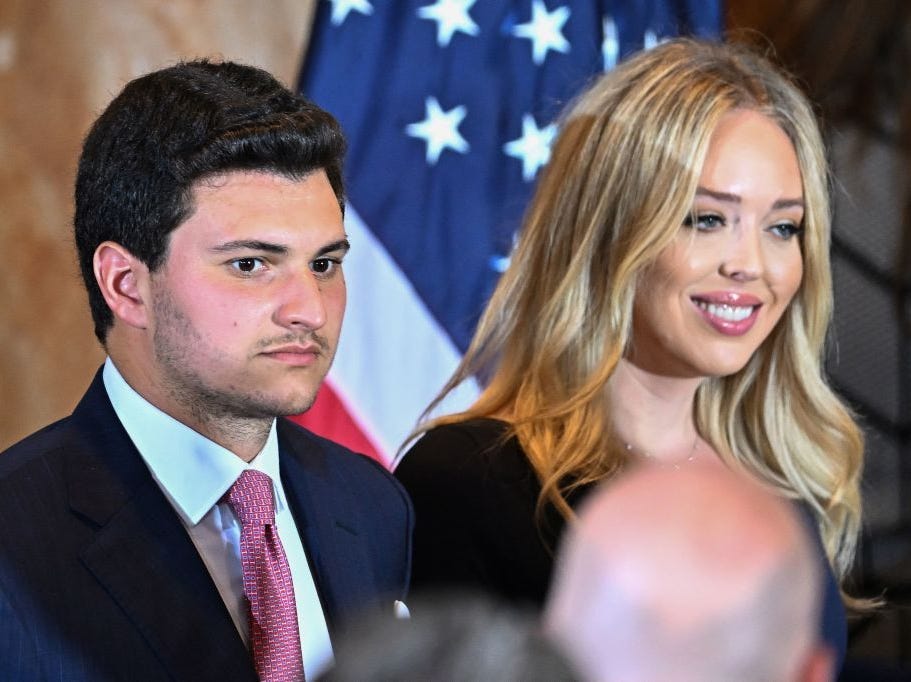 Tiffany Trump and Michael Buolos attend a press conference in April 2023