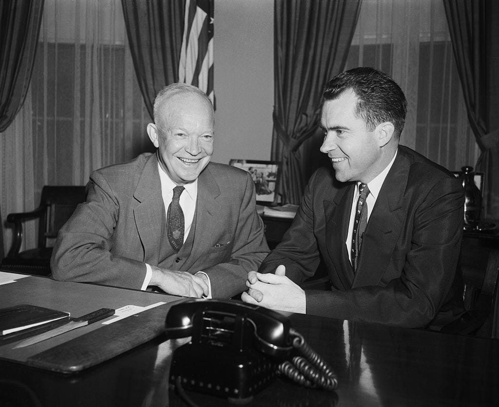 Dwight Eisenhower and Richard Nixon in the Oval Office