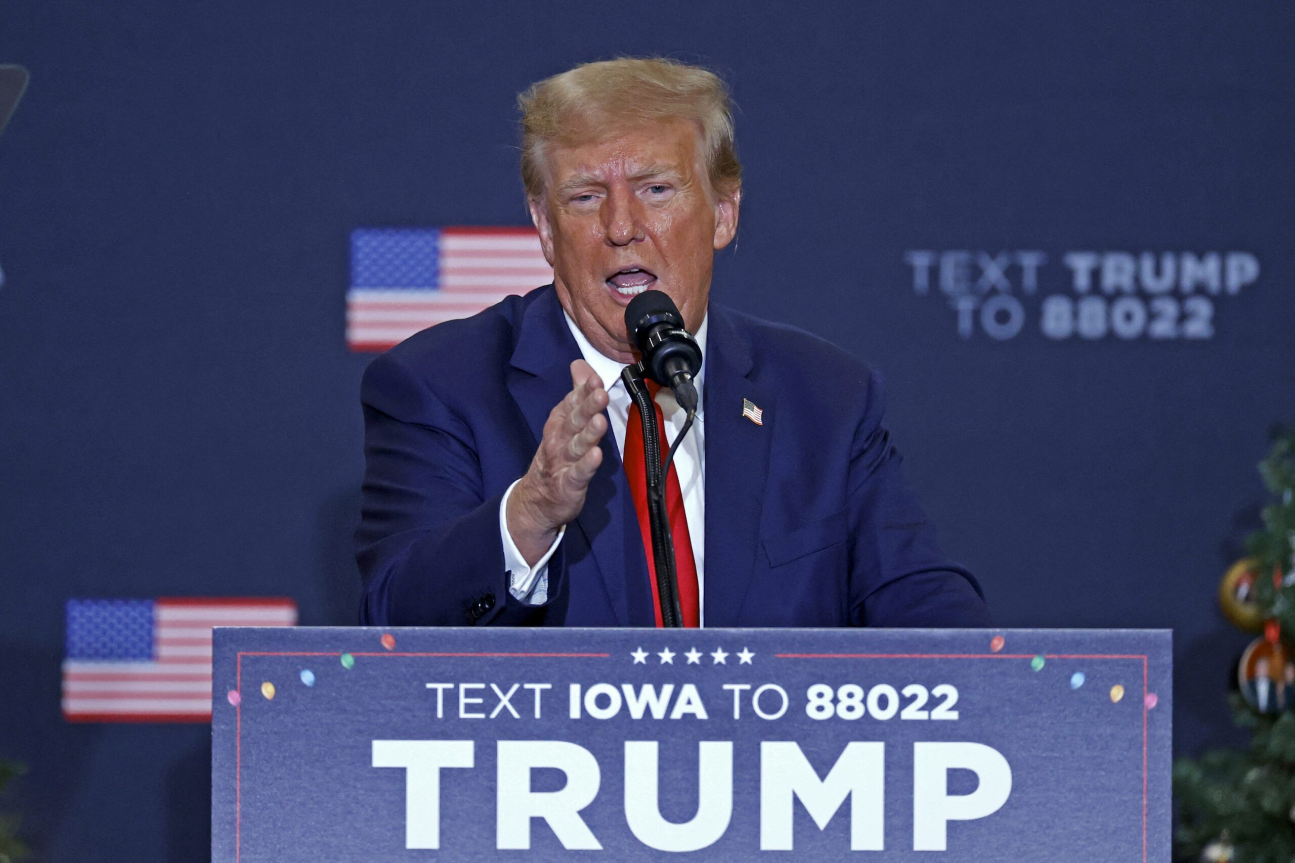De Republikeinse presidentskandidaat Donald Trump tijdens een campagnebijeenkomst in Iowa. Foto: Kamil Krzaczynski / AFP via ANP