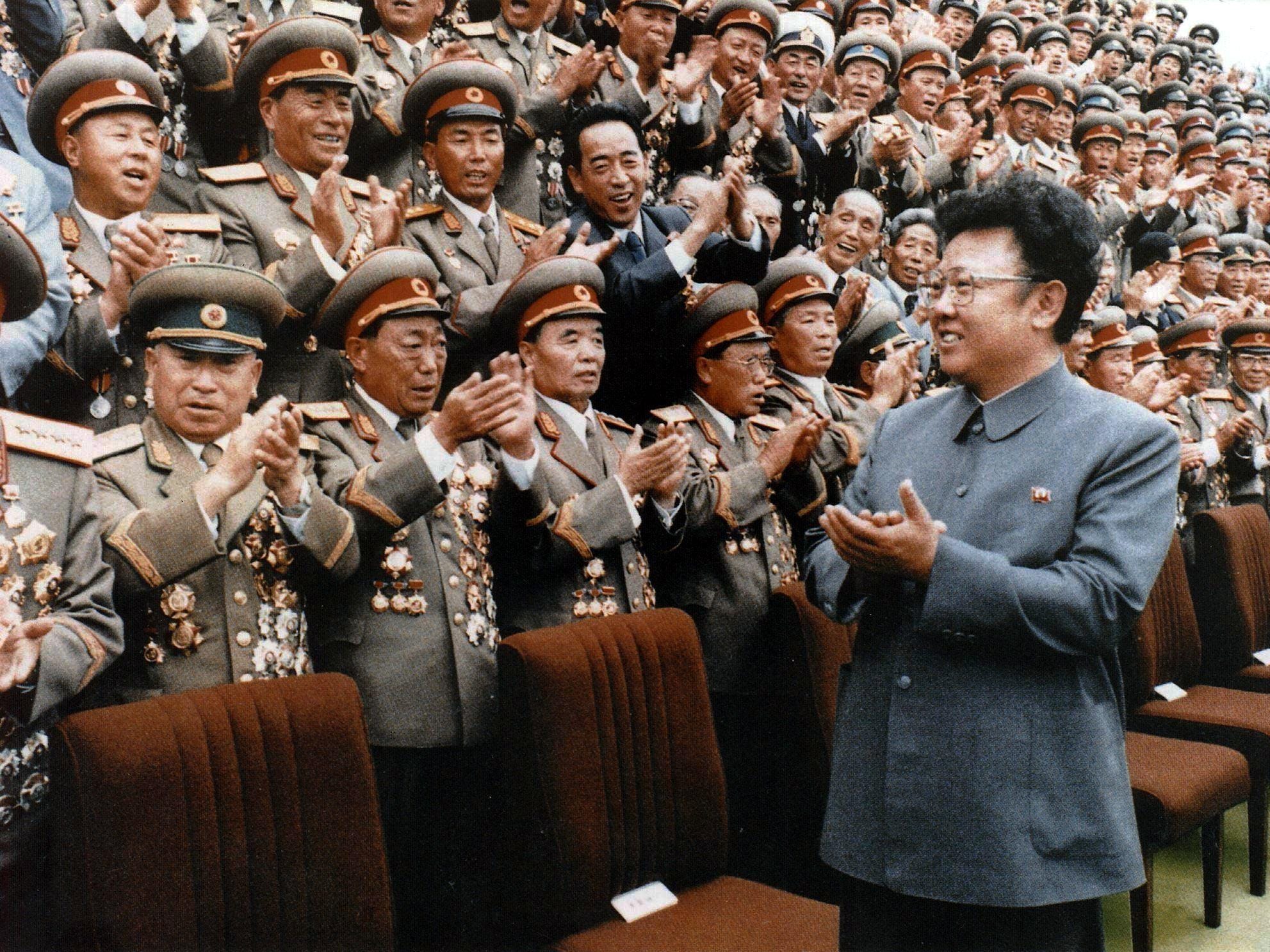 North Korean leader Kim Jong-Il meets with Korean People's Army personnel.