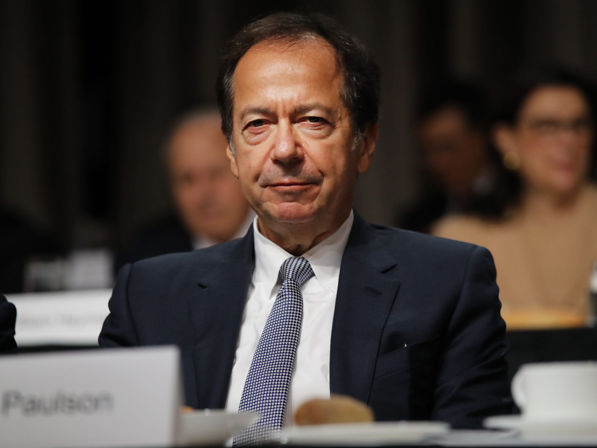Hedge fund manager John Paulson attending a Trump speech in New York in 2019.