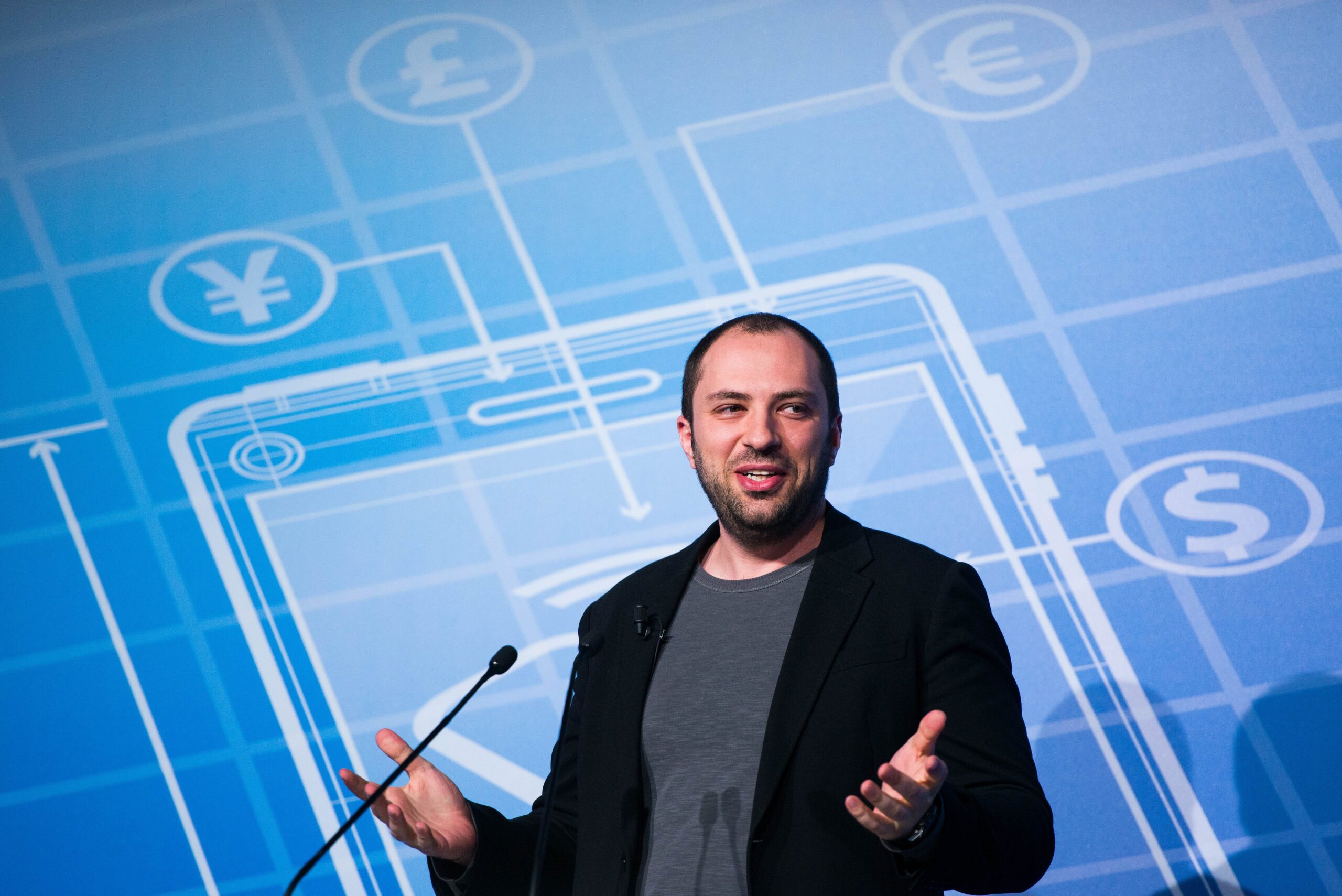 Jan Koum speaking at a conference