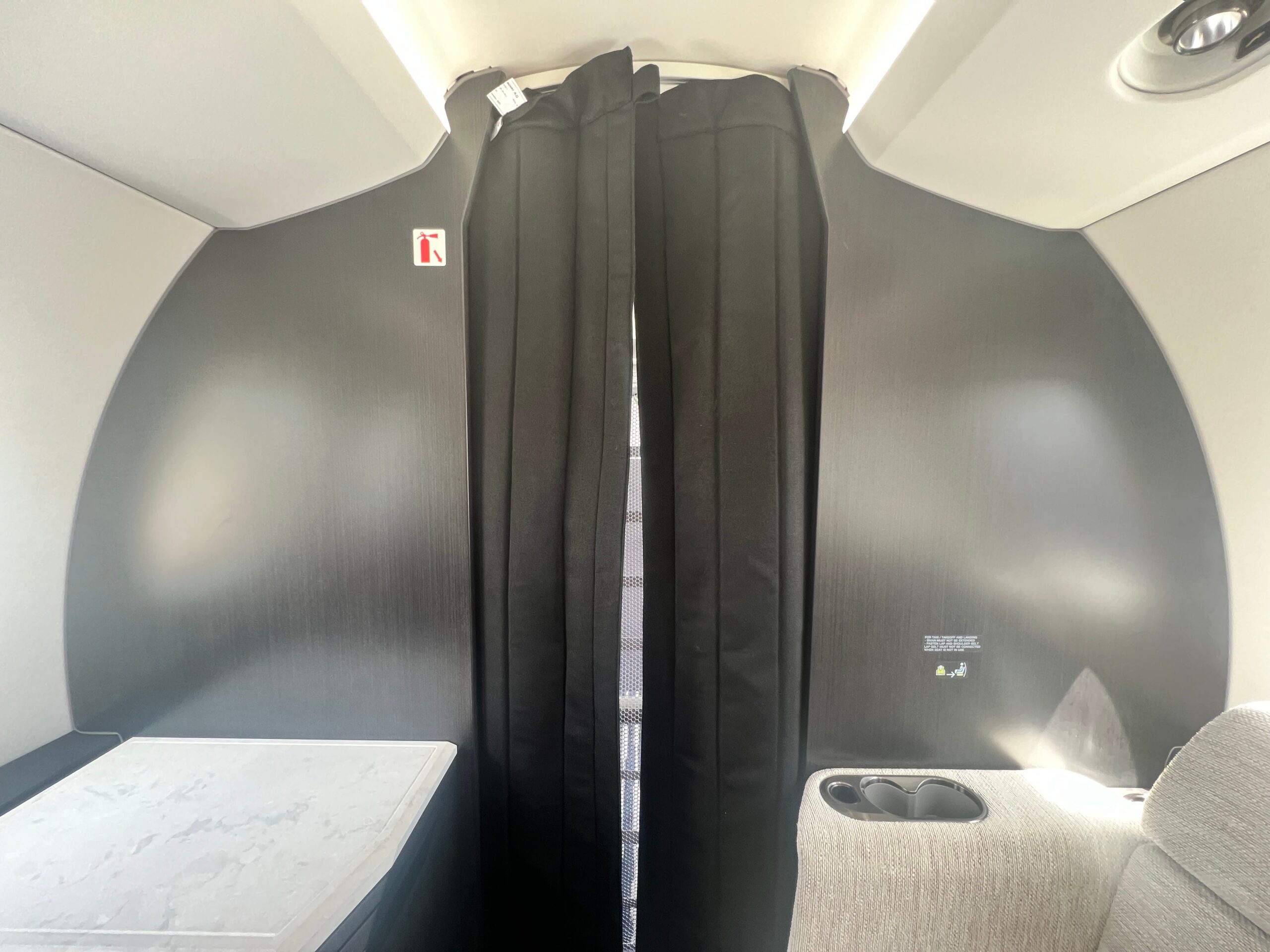 A curtain at the aft of a Pilatus PC-24