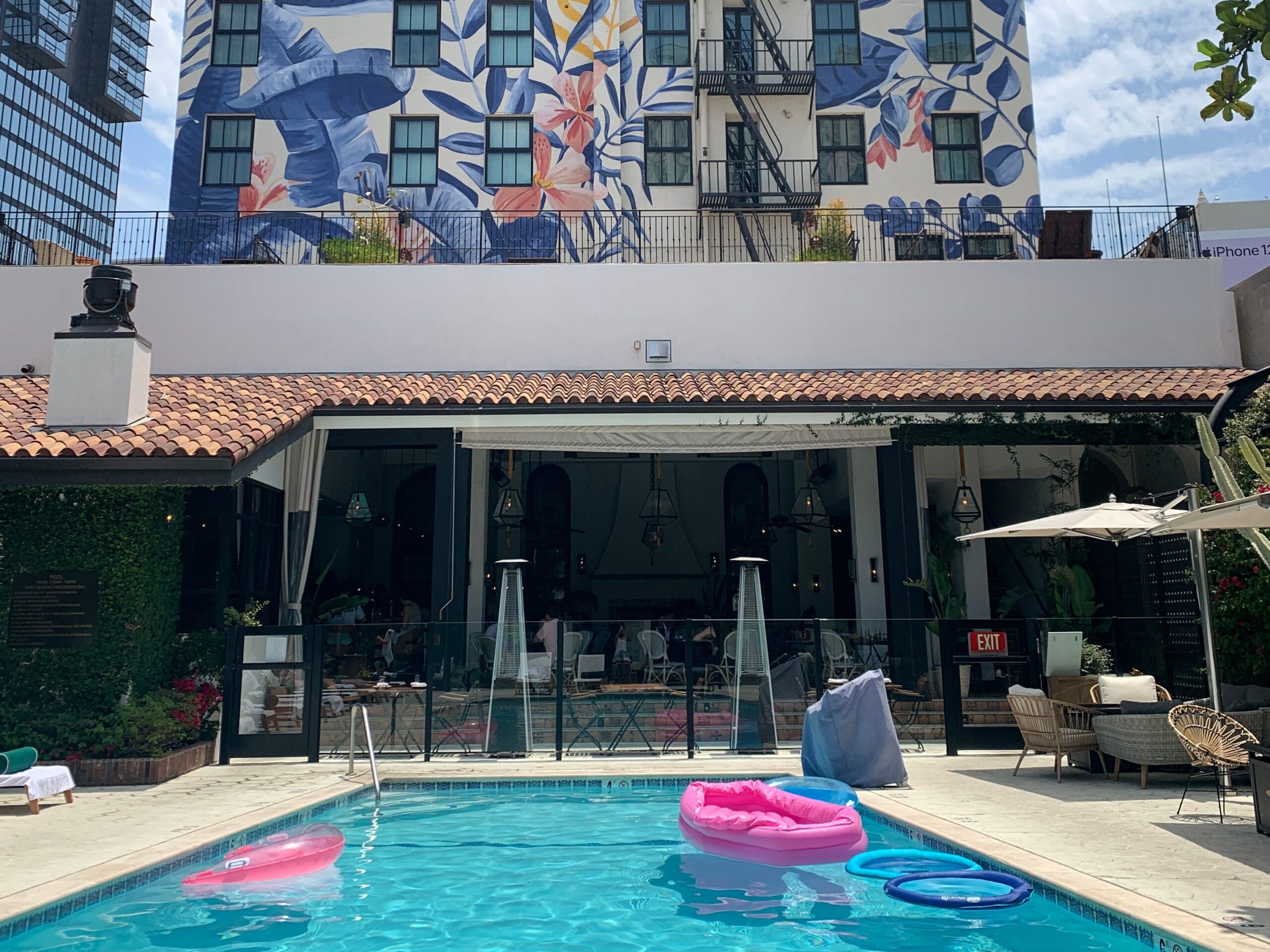 shot of a pool in the back of a hotel