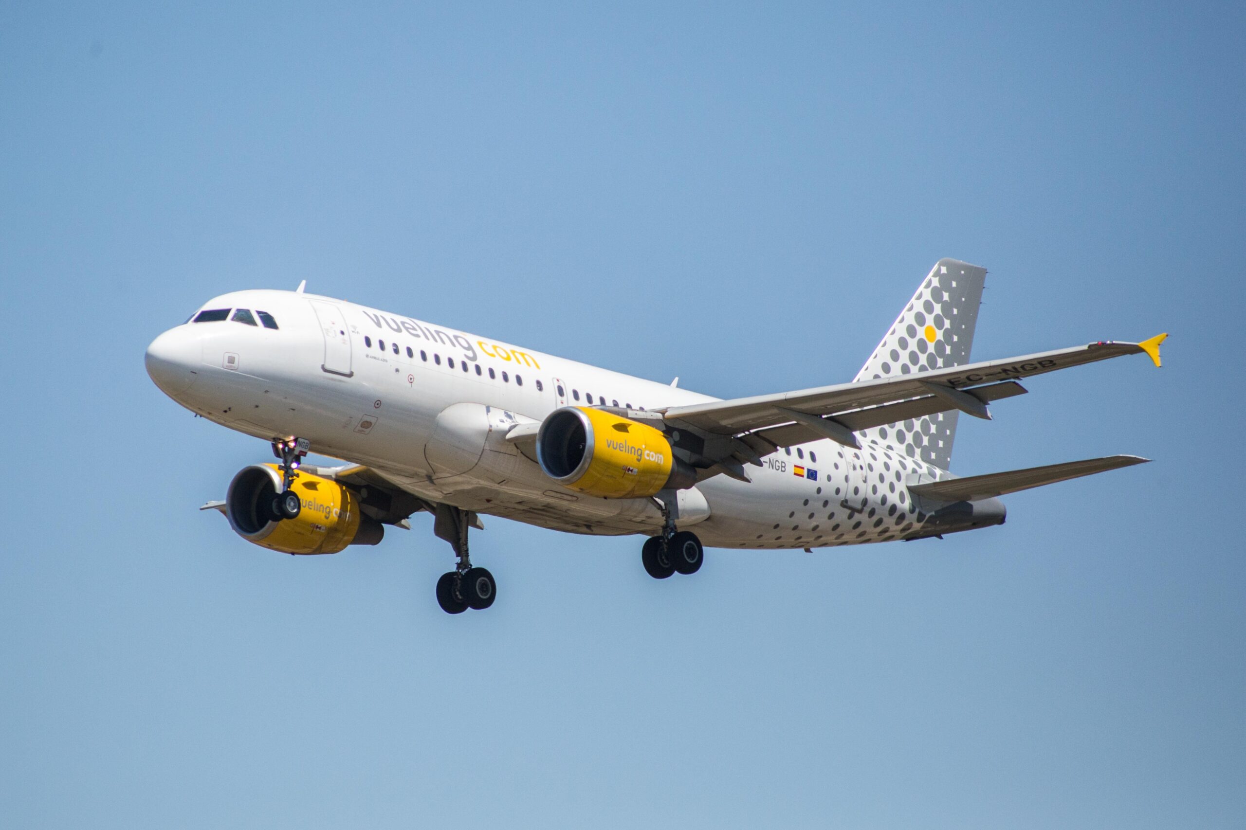 Vueling Airlines airplane is seen landing at El Prat Airport