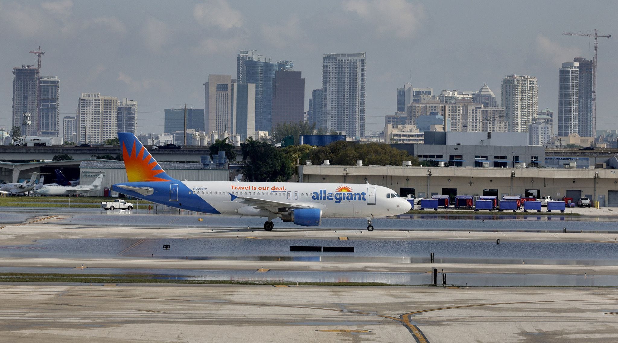 An Allegiant Airlines flight arrives at Fort Lauderdale-Hollywood International Airport on the morning of its reopening Apr. 14, 2023.