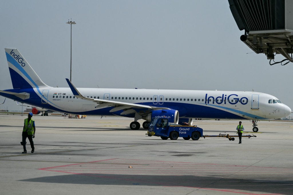 An Indigo aircraft is parked on the tarmac at Kempegowda International airport in Bengaluru on June 1, 2024.