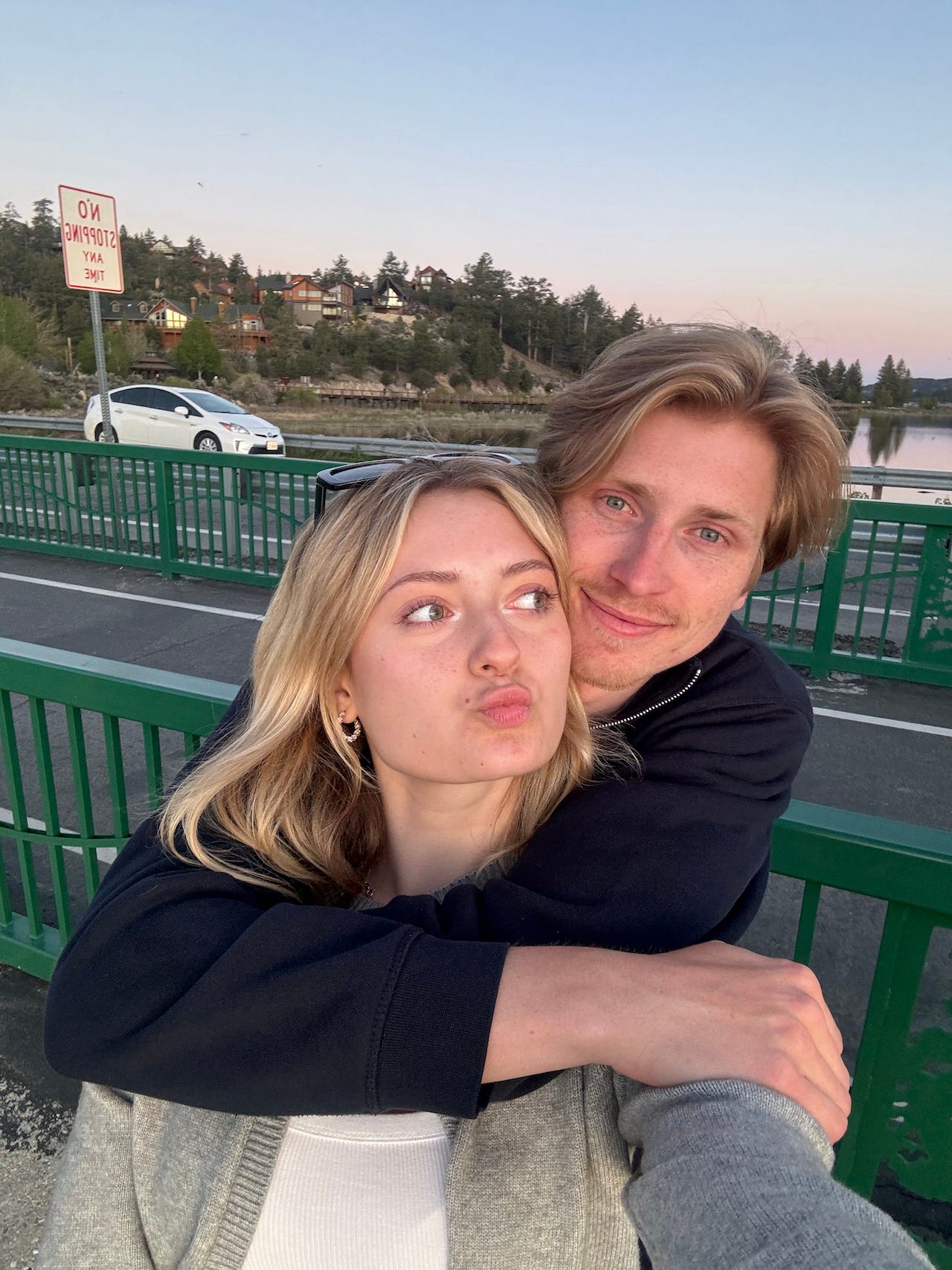 Helena Tomaszewska and Oliver Russell, who bought a private island, smile in a selfie.