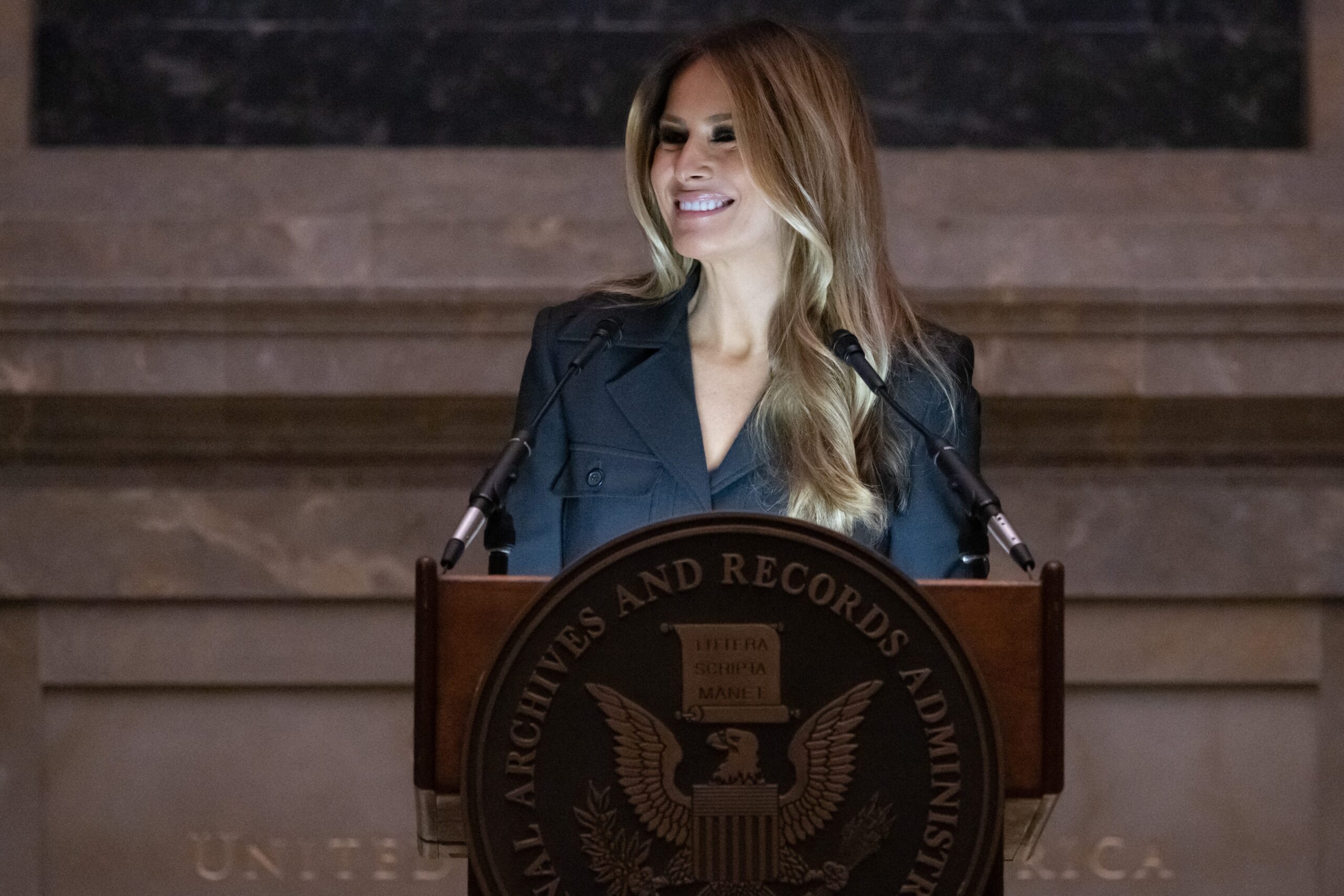 Melania Trump smiles at crowd