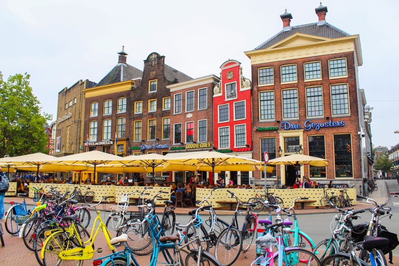 Skip the tourist traps and high prices in Amsterdam — take a short train ride to this beautiful gem instead