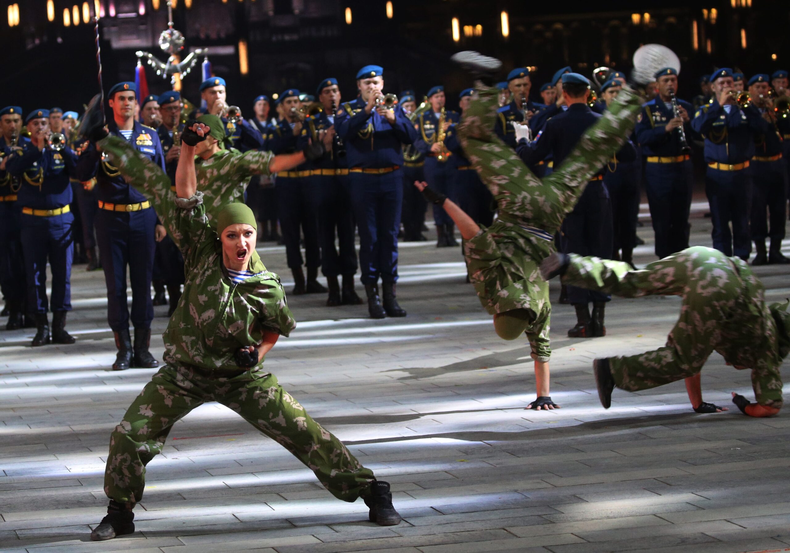 Performers in military uniforms entertain guests at Patriot Park.