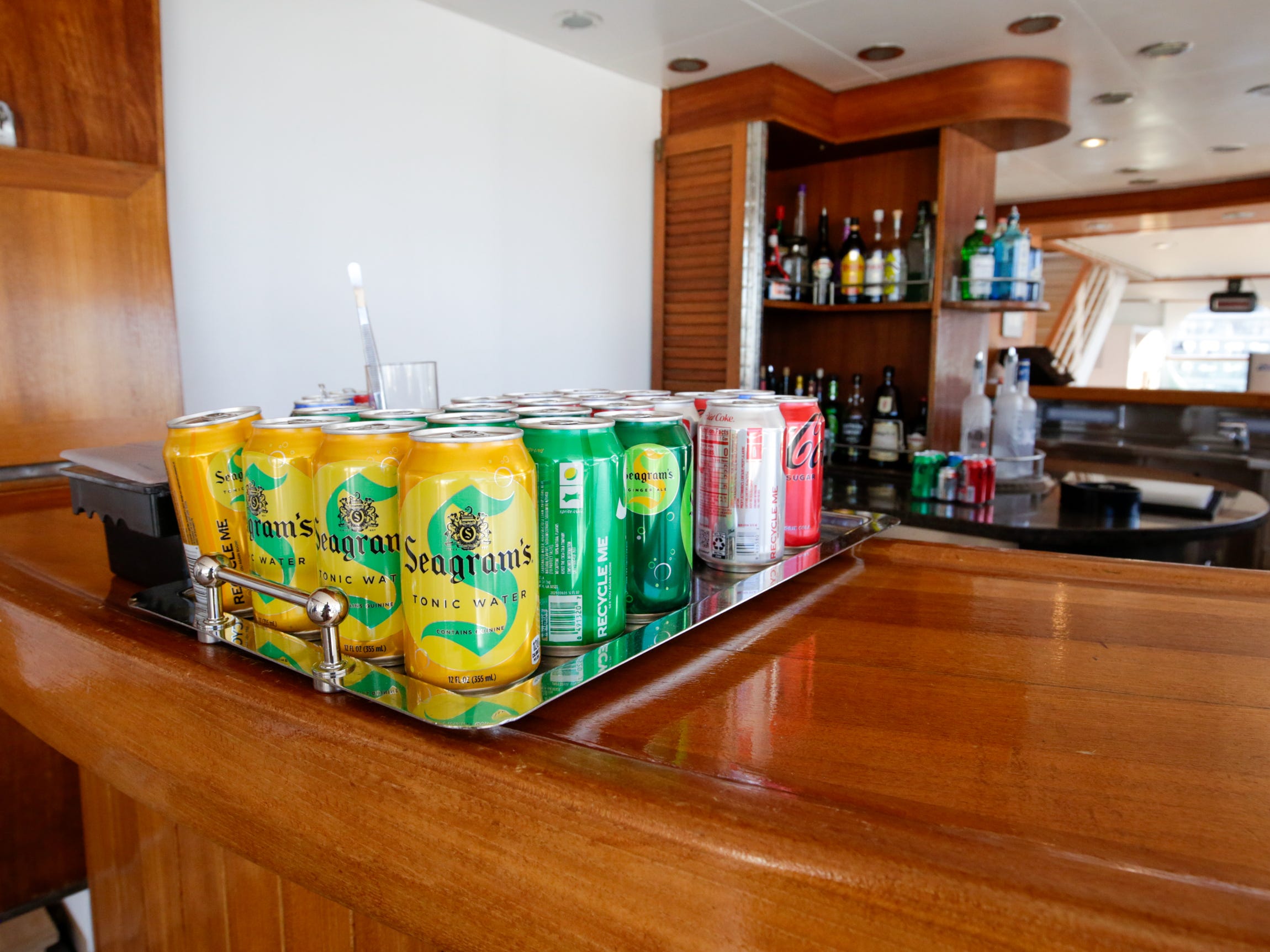 cans of drinks in front of bar on Seabourn Quest