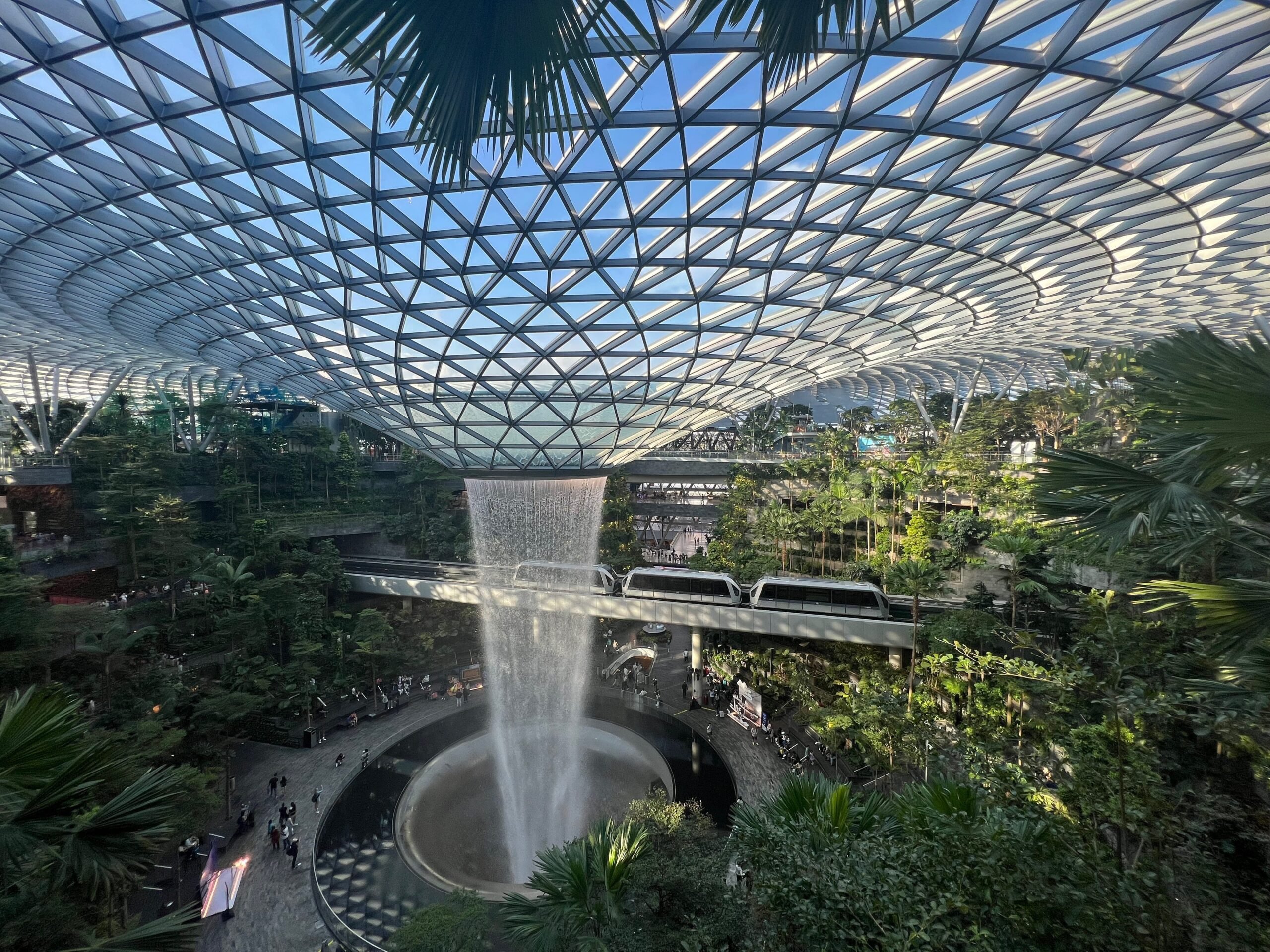 The rain vortex in Jewel with the monorail riding past.