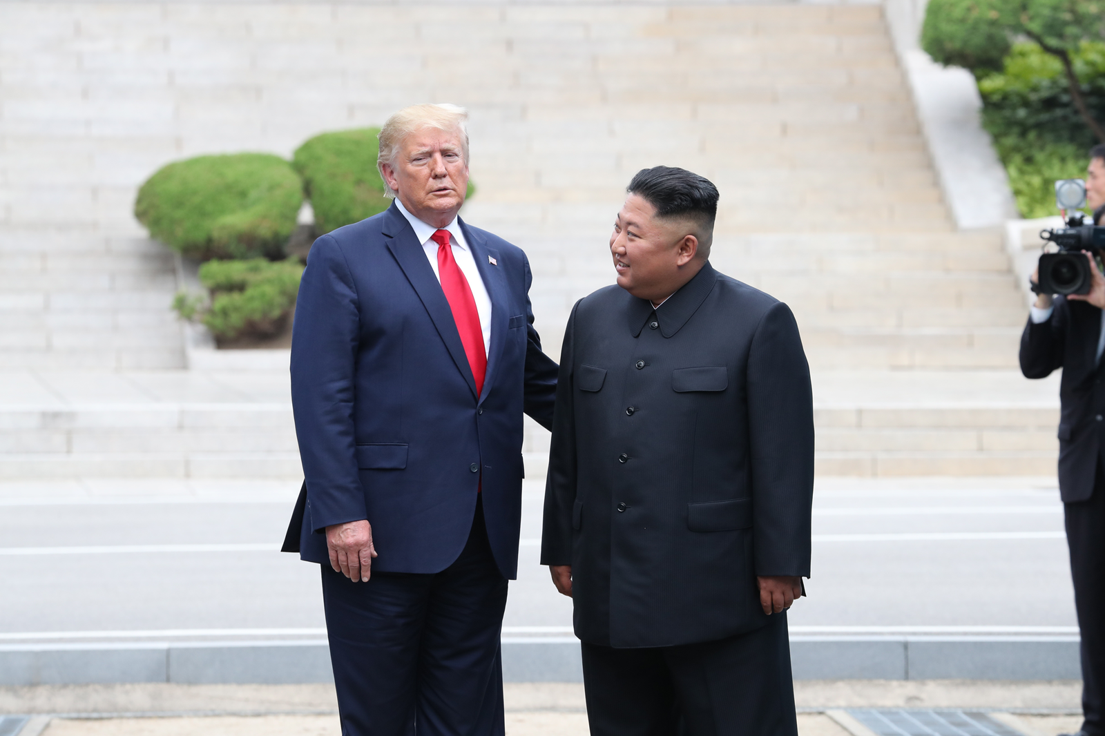 Foto: Donald Trump en Kim Jong-un. EPA/YONHAP SOUTH KOREA OUT