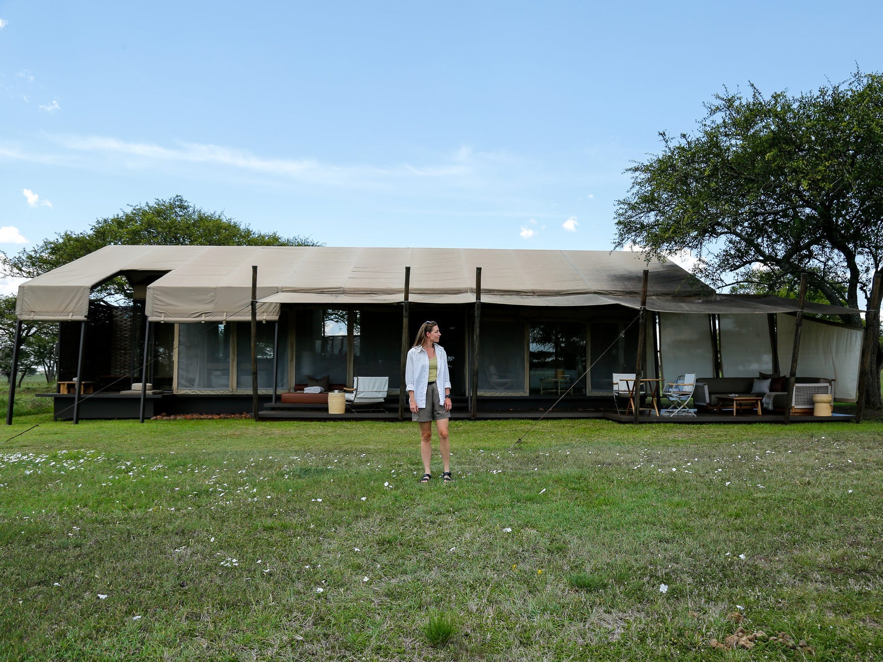 The author in neutrals outside a lodge in the Serengeti.