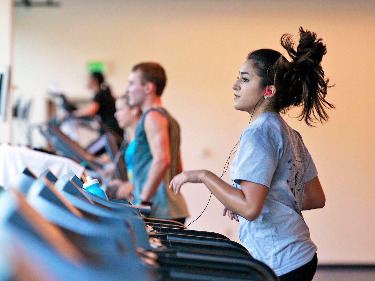 Woman Running on Treadmill