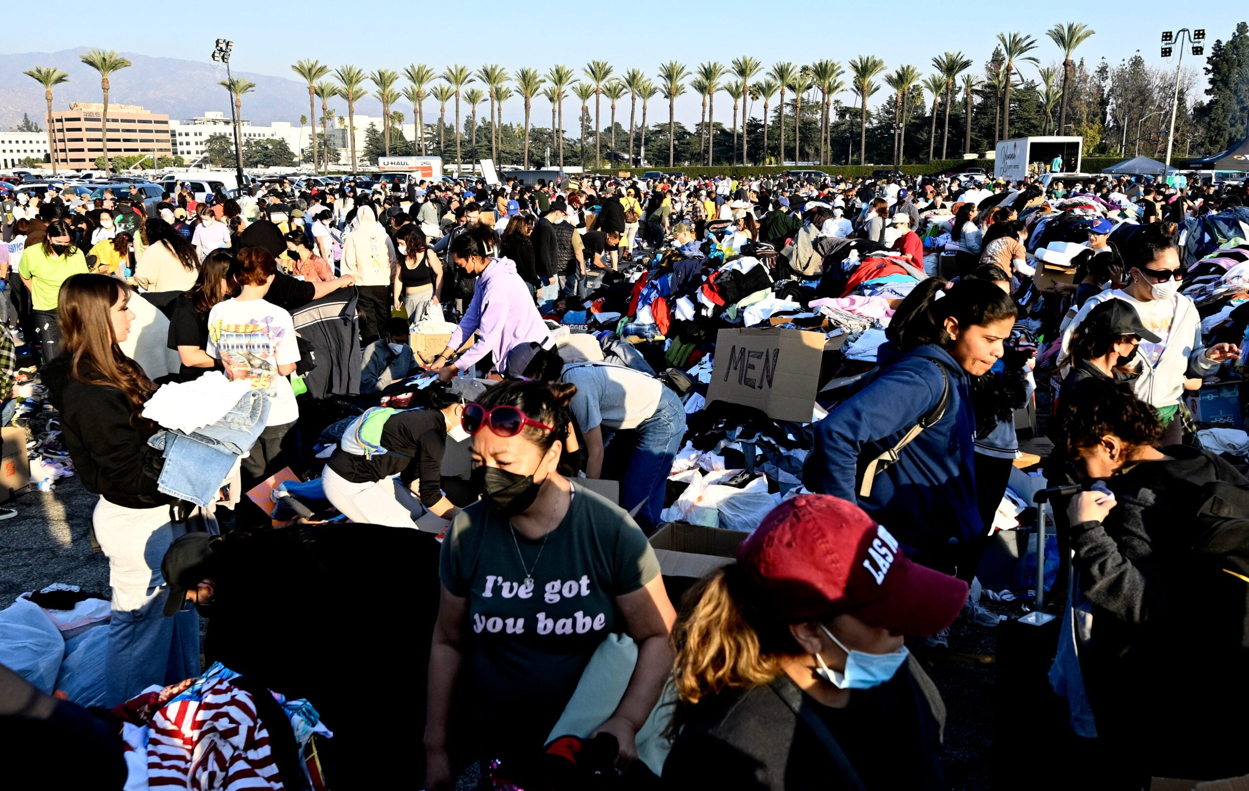 Thousands of people are able to pick up clothes, foods, toiletries during a wild fire relief for victims pop up of Eaton Fire at Santa Anita Park in Arcadia on Saturday, January 11, 2025