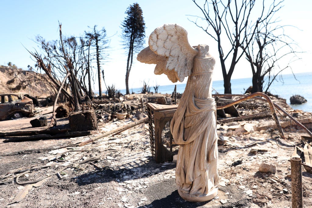 A burned homesite during aftermath of the Palisades fire along Pacific Coast Highway in Malibu, California