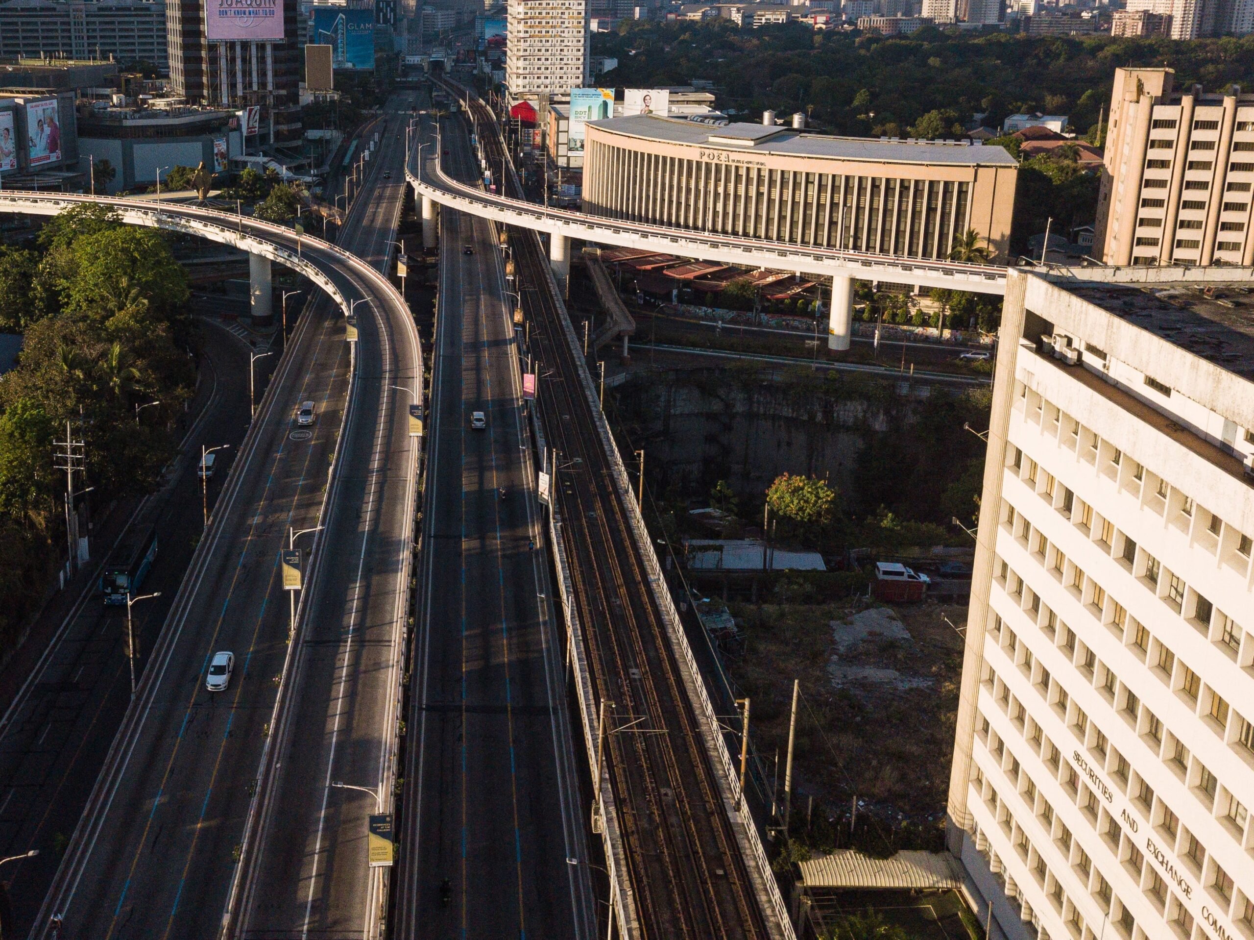 A highway in Mandaluyong, Philippines with buildings on either side