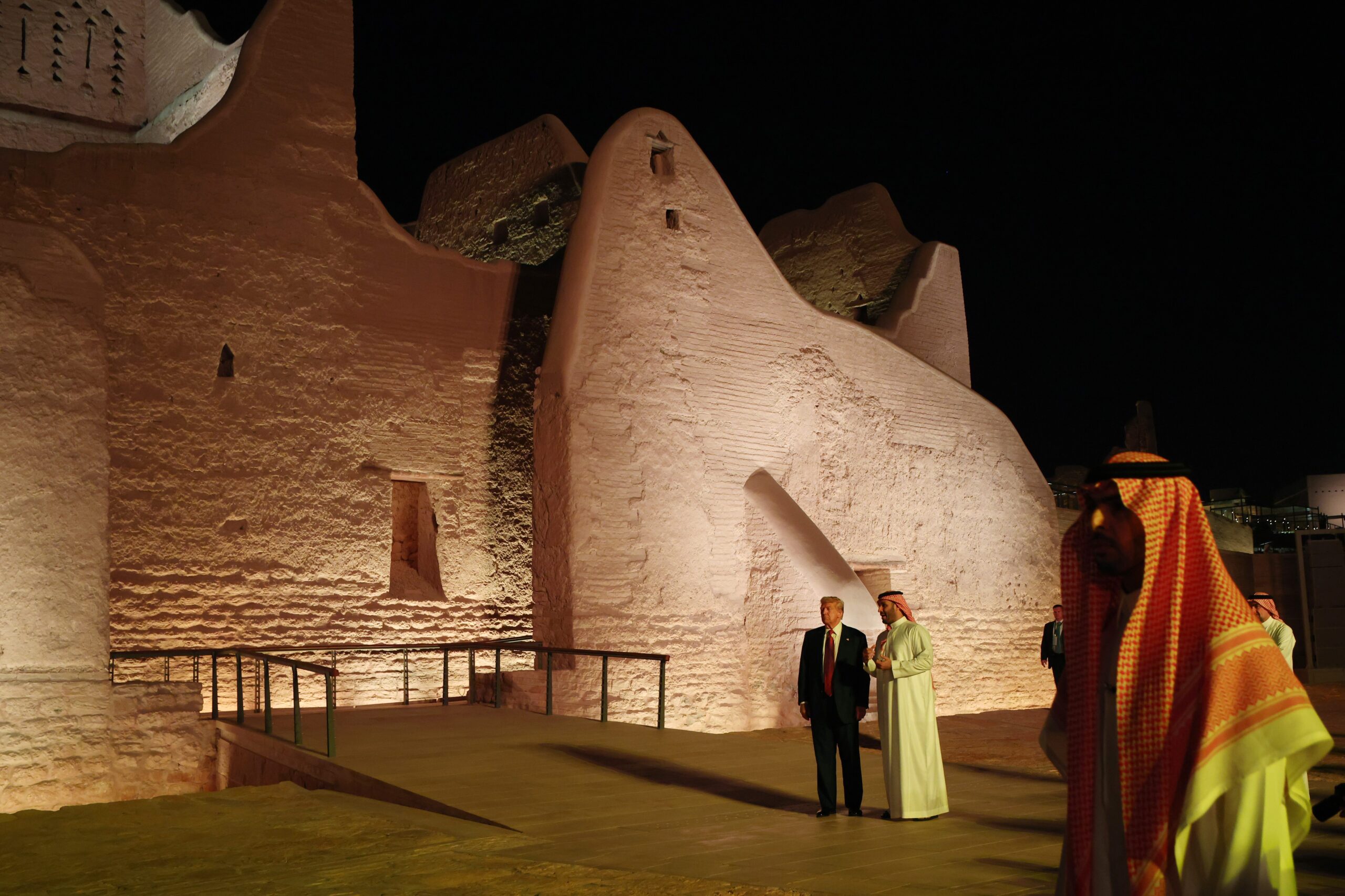 image of trump and crown prince in front of old structure
