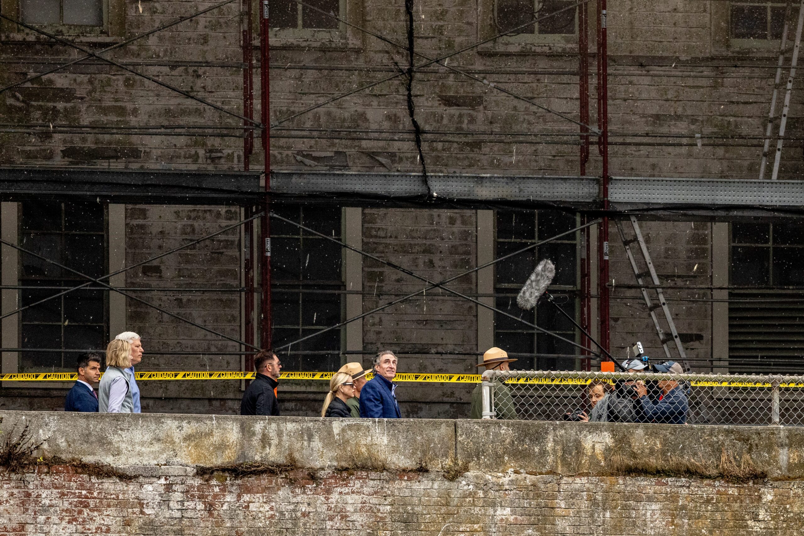 Attorney General Pam Bondi and Interior Secretary Doug Burgum walk on a boat ramp during a visit to Alcatraz Island in San Francisco, Thursday, July 17, 2025